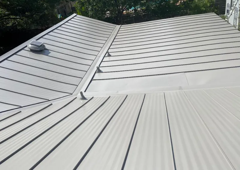 Solar attic fan installed on a metal roof for Roof Ventilation in San Diego Country Estates